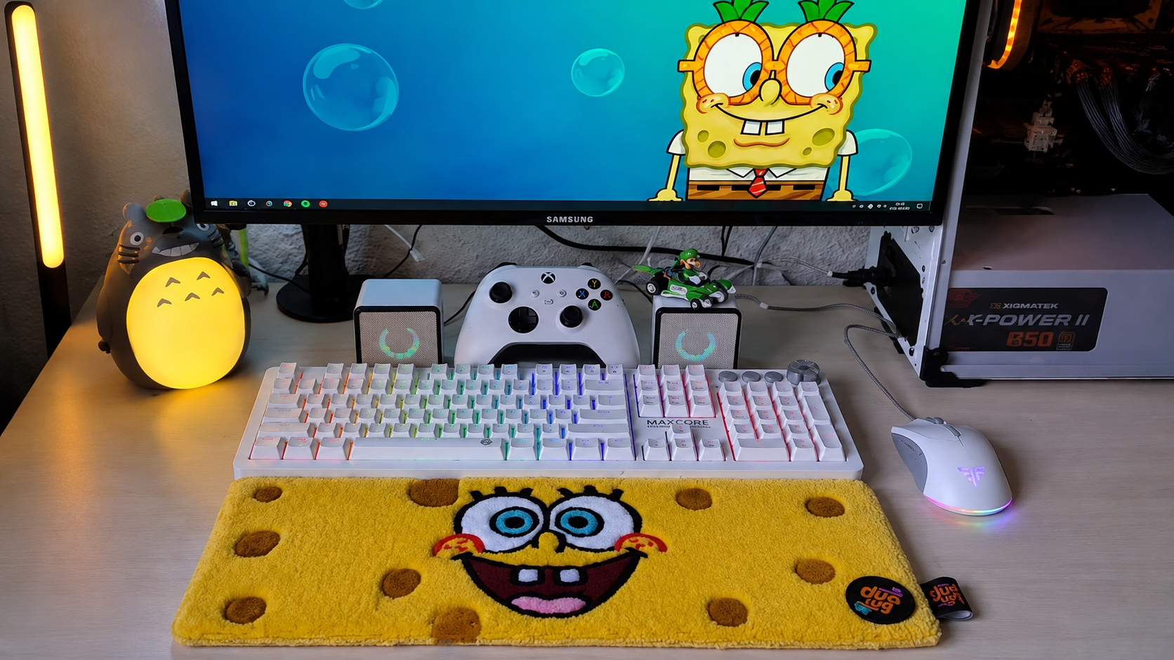 SpongeBob keyboard rug in a gaming setup