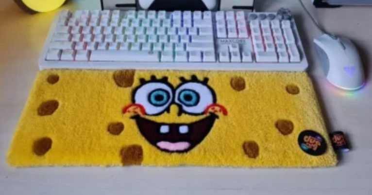 Yellow SpongeBob custom rug on a desk